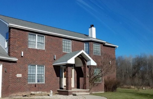 Larsen House | Quiet Country Home on 10 acers of land, located only 23 miles from EAA grounds.