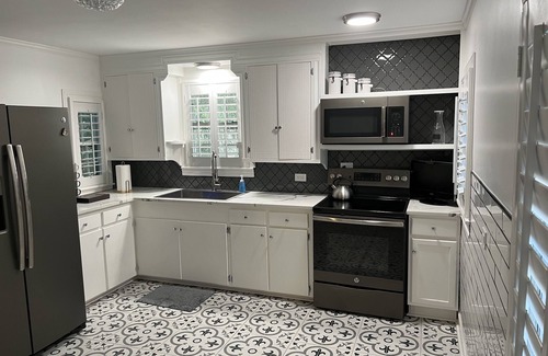 Terrell House | Quiet home in downtown Terrell with a hot tub.