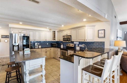 Roach House | Quiet Lakefront House- Family retreat w/calm water, water toys & large swim dock