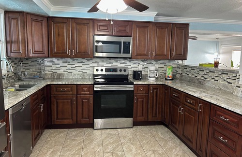 Pinellas Park House | Quiet Pool Haven: 4BR - 9PPL, AC, WiFi, and Beaches Nearby