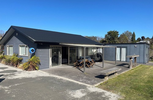 Kawhia House | Quiet private bush out look but right in town. Perfect for boaties