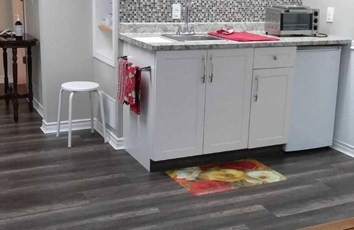 Central Okanagan House | Quiet suite near beach. Serene setting with patios and space to BBQ