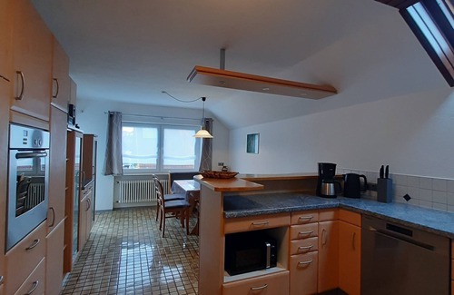 Blumberg Apartment | Quietly located, spacious top floor apartment in two-family house.