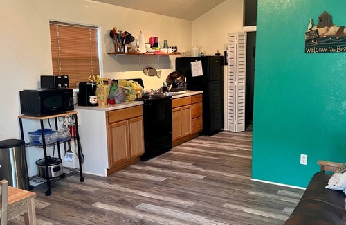 Matagorda Cabin | Quite peaceful cabin resort with pool and BBQ area with firepit!