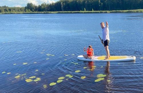 Pedvale Boat Rental | Raft on a forest lake