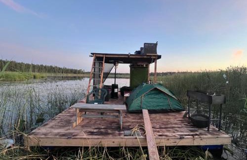 Pedvale Boat Rental | Raft on a forest lake