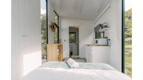 Kuranda House | Rainforest Sunsets by Tiny Away