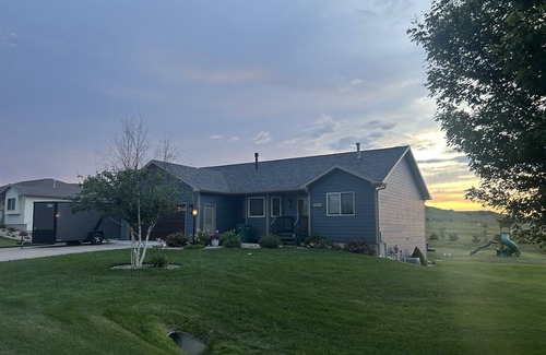 Rapid City House | Rally-Ready Retreat! 4BR/2BA w/Theater, Gym & Parking – 40 Minutes from Sturgis