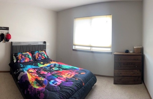 Rapid City House | Rally-Ready Retreat! 4BR/2BA w/Theater, Gym & Parking – 40 Minutes from Sturgis