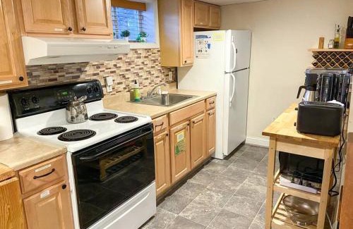Woodridge House | Rare Find Spacious Basement Apartment with Parking