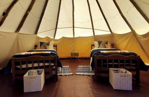 Saddlestring House | Raven Tipi, Rustic "Raven" Tipi by Bighorn Mountains