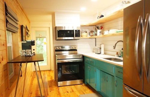 Titusville Cabin | Reach for the Moon and Relax under the Magnolia Trees