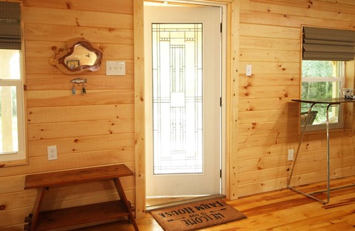 Titusville Cabin | Reach for the Moon and Relax under the Magnolia Trees