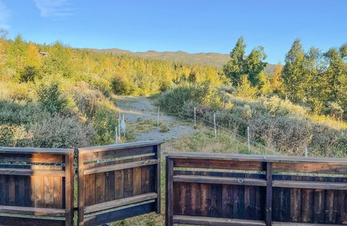 Nordre Land House | Recharge your batteries in this cozy log cabin near the Synna River.