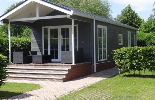 Lathum Ski Chalet | Recreatiepark Jachthaven De Veerstal Lathum - Luxe Chalet