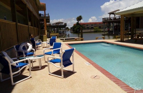 Port Mansfield Condo | Red Fish Condo C, with boat slips and pool.