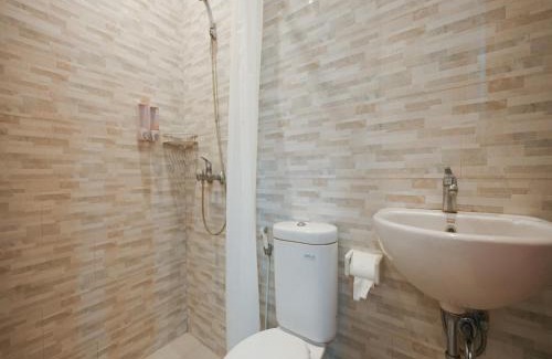 Taman Griya Apartment | RedDoorz Plus at Kencana Residence Jimbaran