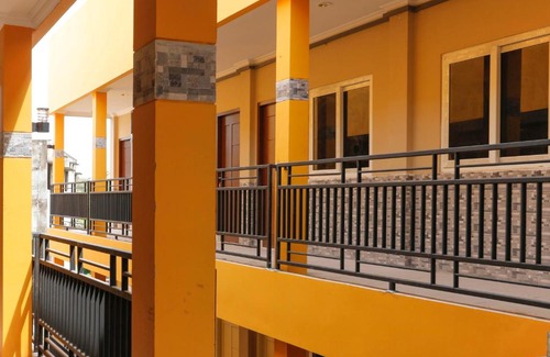 Palembang House | RedDoorz Plus near Palembang Square Mall