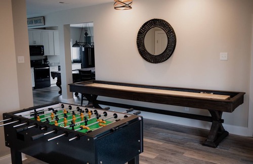 The Point House | Redone Luxury Waterfront at The Point w/Heated Pool, Hot Tub, Fire Pit, Game Rm