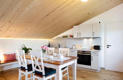 Schlitz Apartment | Refugium aus Vollholz