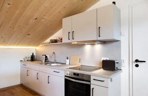 Schlitz Apartment | Refugium aus Vollholz