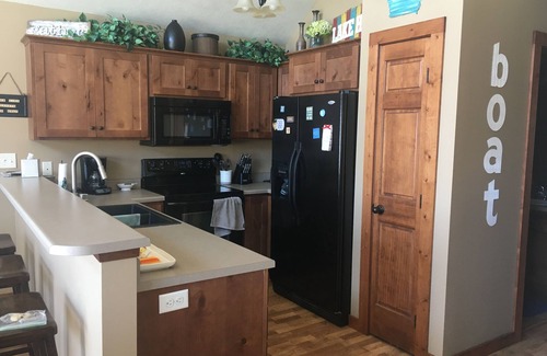 Arnolds Park House | Relax and make fun memories in our Vacation Home at Bridges Bay Resort