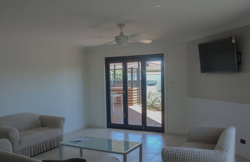 Harrington House | Relax and unwind with just a stroll across the road to the water