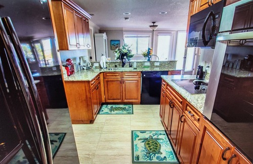 Signal Cove House | Relax in the Dolphin Retreat! Waterfront house with dock and kayaks.