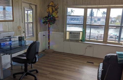 Port Richey House | Relax in your chair on the floating dock as the tide rolls in & catch a few fish