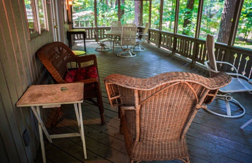 Pine Mountain Ski Chalet | Relax on your screened in porch in this pet friendly chalet!