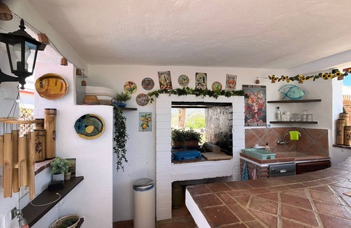 Benamocarra Apartment | Relax & Recharge: Studio Iznate with Pool View & Luxury Kitchen