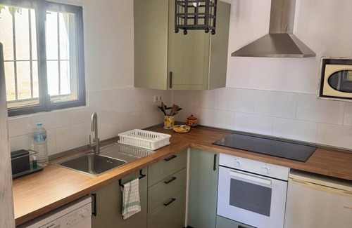 Benamocarra Apartment | Relax & Recharge: Studio Iznate with Pool View & Luxury Kitchen
