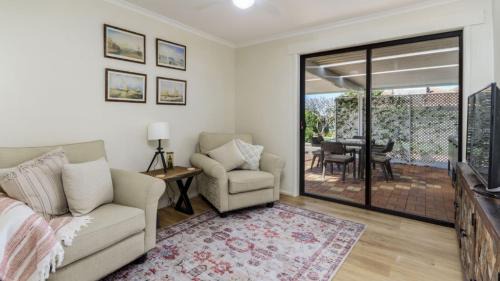 Sandstone Point House | Relax & Unwind Poolside Paradise