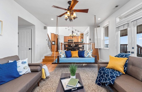 Sandy House | Relaxing 6BR Getaway: Hot Tub, Games & Stunning Views