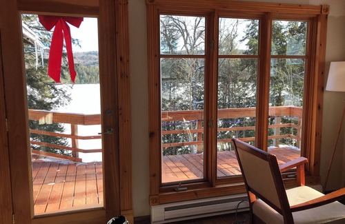 Labelle Ski Chalet | Relaxing by Lac Labelle with a roaring fire outside