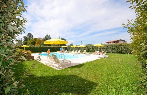 San Michele al Tagliamento Apartment | Relaxing escape in a green oasis
