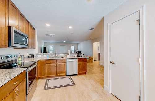 Port Malabar House | Relaxing home with patio, W/D, full kitchen, & Pack-N-Play - golf nearby