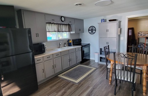 Hingham Cottage | Relaxing lakeside cottage just 20 minutes from Road America & Fond du Lac.