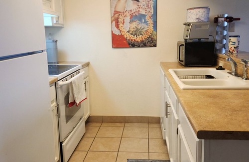 South Padre Island Condo | Relaxing Retreat with Pool & Hot Tub, Partial Ocean View - Steps from Beach