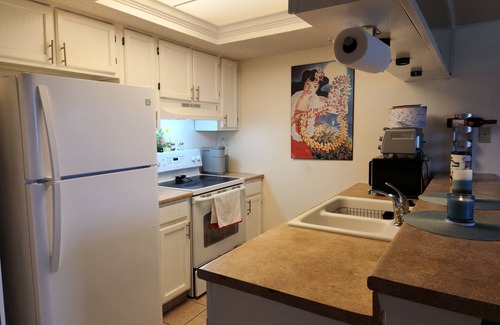 South Padre Island Condo | Relaxing Retreat with Pool & Hot Tub, Partial Ocean View - Steps from Beach
