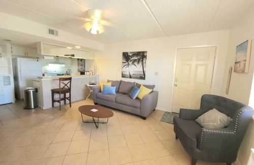 South Padre Island Condo | Relaxing Retreat with Pool & Hot Tub, Partial Ocean View - Steps from Beach