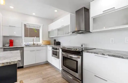 Loves Park House | Relaxing Riverside Stay w HotTub