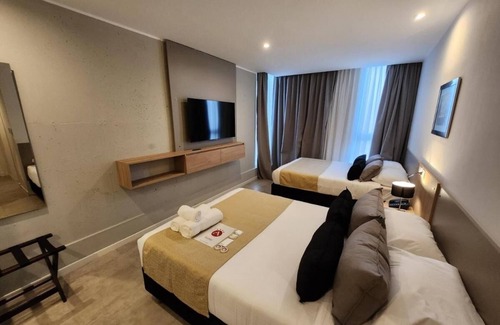 Rio Cuarto Hotel | Relaxing Room With Pool Free Breakfast And Parking Near Local Attractions