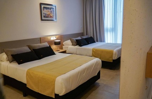Rio Cuarto Hotel | Relaxing Room With Pool Free Breakfast And Parking Near Local Attractions