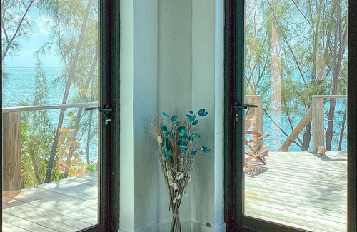 Rainbow Bay House | Remodeled Oceanfront Cottage Directly on the Warm Calm Caribbean