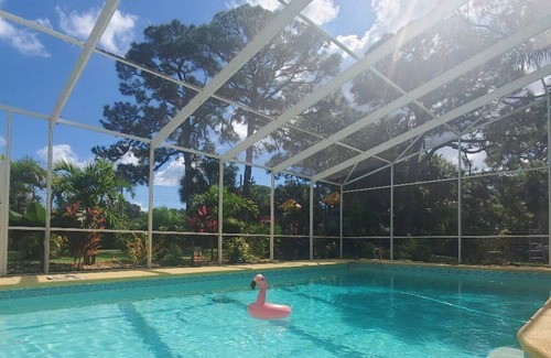 Rockledge Apartment | Remodeled studio in Rockledge, with sliders to pool and huge tropical yard.