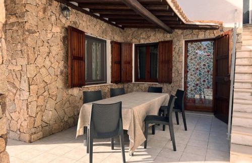 Porto Pino House | Renato Apartments
