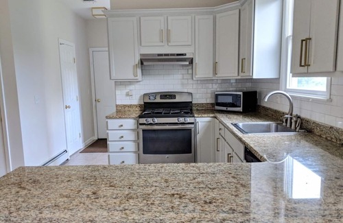 Greenport House | Renovated 4-Bedroom House with Heated Pool & Private Beach Access