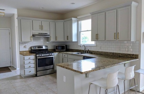 Greenport House | Renovated 4-Bedroom House with Heated Pool & Private Beach Access