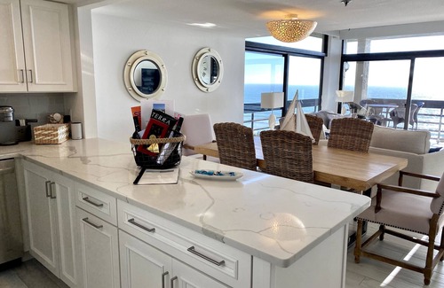 Longboat Key Condo | Renovated and bright corner beachfront unit in well appointed popular complex!